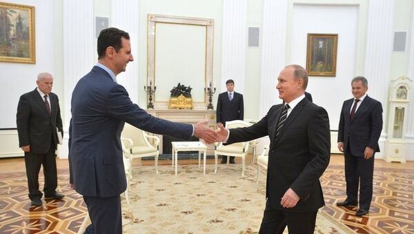 Президент России Владимир Путин и президент Сирии Башар Асад во время встречи в Кремле - Sputnik Moldova-România