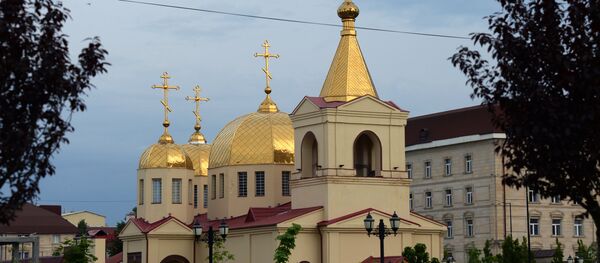 Боевики попытались захватить заложников в церкви в Грозном - Sputnik Moldova
