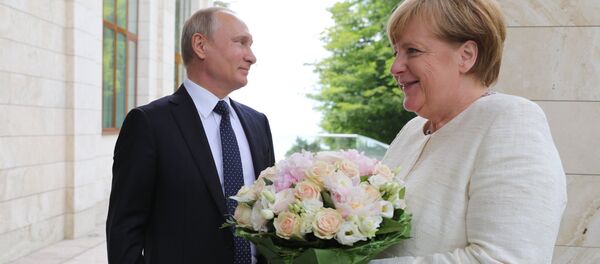 Президент РФ В. Путин встретился с канцлером ФРГ А. Меркель - Sputnik Moldova-România