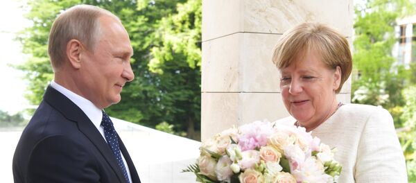 Президент РФ В. Путин встретился с канцлером ФРГ А. Меркель - Sputnik Moldova-România