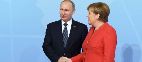 Президент РФ Владимир Путин и федеральный канцлер ФРГ Ангела Меркель - Sputnik Молдова