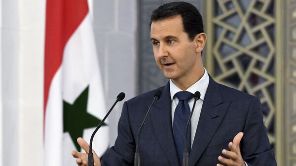 Syrian President Bashar Assad speaks to dozens of Syrian diplomats, in Damascus, Syria (File) - Sputnik Moldova