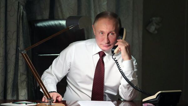 Putin, în timpul unei convorbiri telefonice - Sputnik Moldova