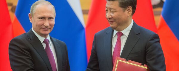 Wladimir Putin und Xi Jinping in China - Sputnik Moldova