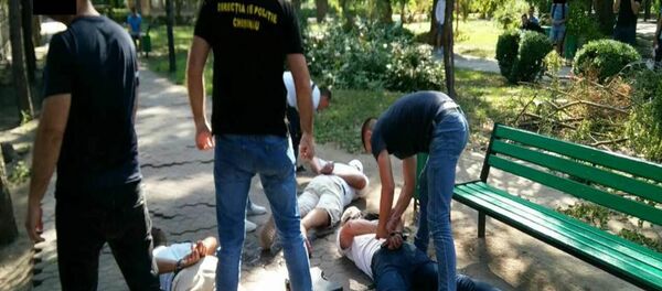 Grupare criminală încătușată de polițiști Grupare criminală încătușată de polițiști - Sputnik Moldova