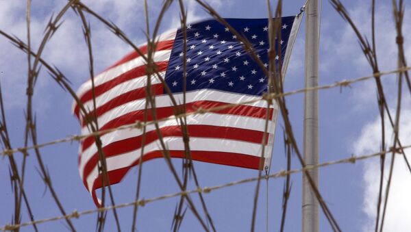 A US flag flies in this April 24 2007 file photo at Camp V inside Camp Delta at the US Naval Station in Guantanamo Bay, Cuba - Sputnik Moldova-România