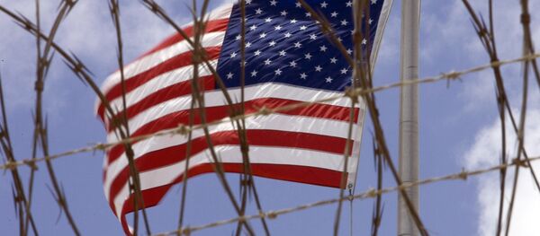 A US flag flies in this April 24 2007 file photo at Camp V inside Camp Delta at the US Naval Station in Guantanamo Bay, Cuba - Sputnik Moldova-România