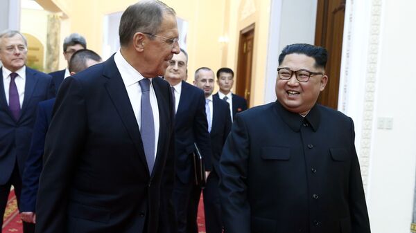 Russian Foreign Minister Sergei Lavrov, left, and North Korean leader Kim Jong Un meet in Pyongyang - Sputnik Moldova-România