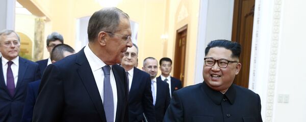 Russian Foreign Minister Sergei Lavrov, left, and North Korean leader Kim Jong Un meet in Pyongyang - Sputnik Moldova-România
