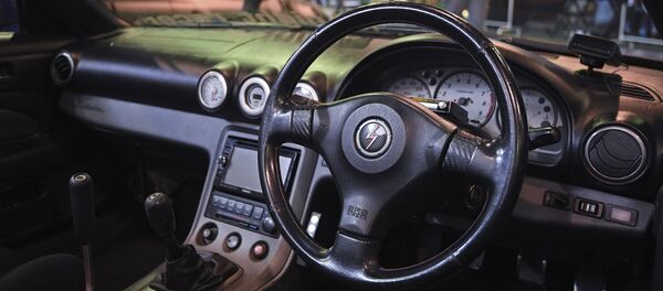 Руль автомобиля с правосторонним управлением Руль автомобиля с правосторонним управлением - Sputnik Молдова