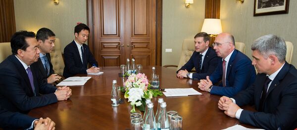 Premierul Pavel Filip și președintele INTERPOL, Meng Hongwei - Sputnik Moldova