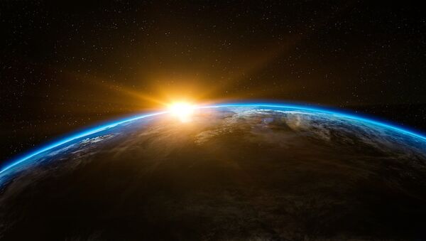 Восхождение солнца над землей в открытом космосе - Sputnik Moldova-România