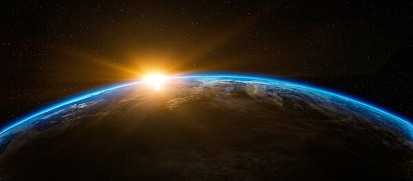 Восхождение солнца над землей в открытом космосе - Sputnik Молдова