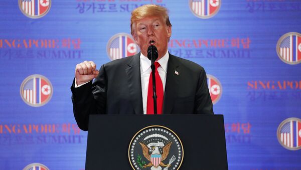 U.S. President Donald Trump speaks during a news conference after his meeting with North Korean leader Kim Jong Un at the Capella Hotel on Sentosa island in Singapore June 12, 2018 - Sputnik Moldova