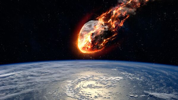 Meteor glowing as it enters the Earth's atmosphere. Elements of this image furnished by NASA. - Sputnik Молдова