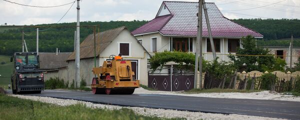 Drumul din satul Drăguşeni, comuna Rădeni, raionul Străşeni, reabilitat în cadrul programului „Drumuri bune pentru Moldova” Drumul din satul Drăguşeni, comuna Rădeni, raionul Străşeni, reabilitat în cadrul programului „Drumuri bune pentru Moldova” - Sputnik Moldova