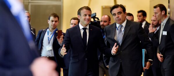 French President Emmanuel Macron arrives to take part in an emergency European Union leaders summit on immigration, in Brussels, Belgium June 24, 2018 - Sputnik Moldova-România