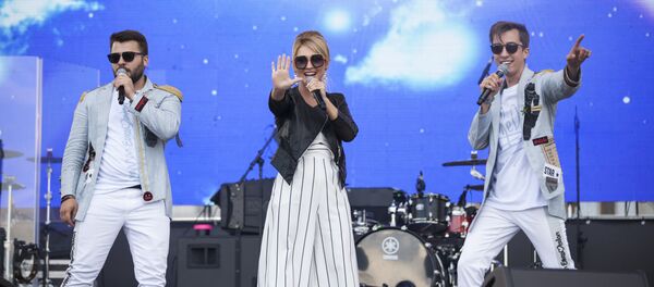 Участники молдавской группы DoReDoS Марина Джундиет, Евгений Андриянов и Сергей Мыца. - Sputnik Молдова