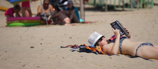 Odpoczynek na plaży - Sputnik Молдова