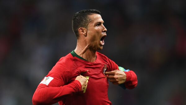 Криштиану Роналду радуется забитому голу в матче группового этапа чемпионата мира по футболу между сборными Португалии и Испании - Sputnik Молдова