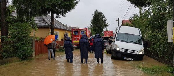 Эвакуациия в одном из сел Румынии из-за последствий непогоды Эвакуациия в одном из сел Румынии из-за последствий непогоды - Sputnik Молдова