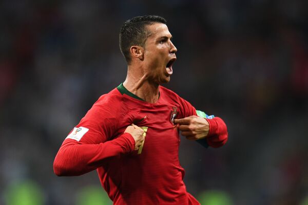 Cristiano Ronaldo este încântat de golul marcat în etapa de grup a Cupei Mondiale între Portugalia și Spania - Sputnik Moldova