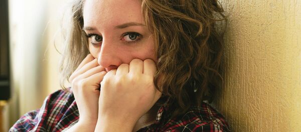 A scared woman - Sputnik Moldova-România