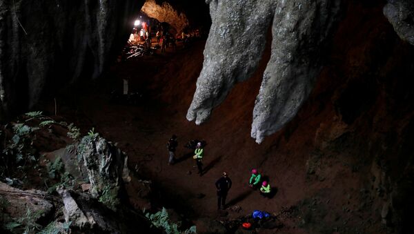 Rescue workers are seen in Tham Luang caves during a search for 12 members of an under-16 soccer team and their coach, in the northern province of Chiang Rai, Thailand, June 27, 2018. - Sputnik Moldova-România