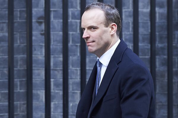 In this file photo taken on February 06, 2018 Dominic Raab, then Minister of State for Housing and Planning, leaves 10 Downing street after the weekly cabinet meeting on February 6, 2018 in London In this file photo taken on February 06, 2018 Dominic Raab, then Minister of State for Housing and Planning, leaves 10 Downing street after the weekly cabinet meeting on February 6, 2018 in London - Sputnik Moldova