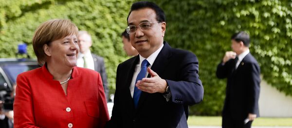 Li Keqiang și Angela Merkel Li Keqiang și Angela Merkel - Sputnik Moldova-România