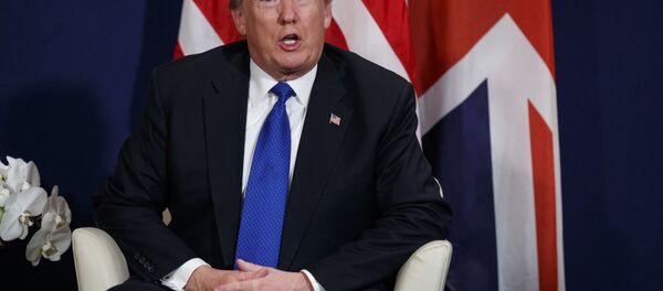 President Donald Trump listens during a meeting with British Prime Minister Theresa May at the World Economic Forum, Thursday, Jan. 25, 2018, in Davos. President Donald Trump listens during a meeting with British Prime Minister Theresa May at the World Economic Forum, Thursday, Jan. 25, 2018, in Davos. - Sputnik Moldova-România