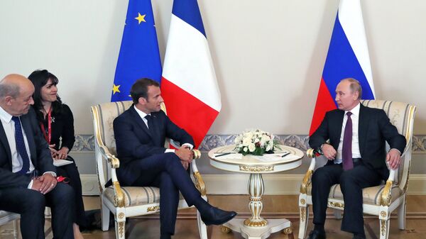 May 24, 2018. Russian President Vladimir Putin, and French President Emmanuel Macron, third left, during a meeting in Konstantin Palace, Strelna on the sidelines of the St. Petersburg International Economic Forum - Sputnik Moldova