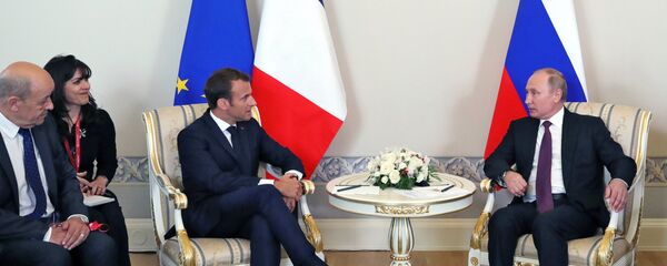 May 24, 2018. Russian President Vladimir Putin, and French President Emmanuel Macron, third left, during a meeting in Konstantin Palace, Strelna on the sidelines of the St. Petersburg International Economic Forum - Sputnik Moldova-România