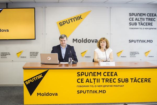 Евгений Паскарь и Ольга Гагауз - Sputnik Молдова