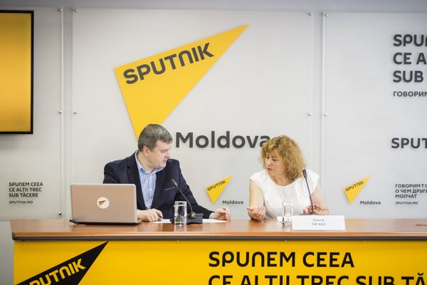 Евгений Паскарь и Ольга Гагауз - Sputnik Молдова