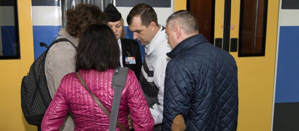 Pasageri tren gara feroviară поезд пасажиры ЖД-вокзал Pasageri tren gara feroviară поезд пасажиры ЖД-вокзал - Sputnik Молдова