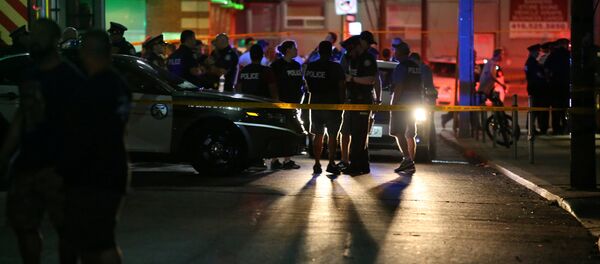 Полиция возле места массового расстрела в Торонто, Канада, 23 июля 2018 - Sputnik Молдова