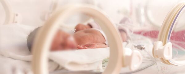 Новорожденный ребенок в роддоме - Sputnik Moldova-România