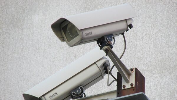 Камера видеонаблюдения на здании - Sputnik Moldova
