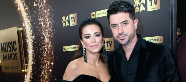 Певица Ани Лорак с супругом Муратом Налчаджиоглу Певица Ани Лорак с супругом Муратом Налчаджиоглу - Sputnik Молдова