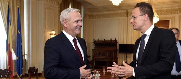Liviu Dragnea și Peter Szijjarto, ministrul de Externe al Ungariei - Sputnik Moldova-România