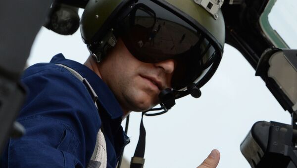 Командир в кабине вертолета Ми-28 во время учений отдельного вертолетного полка на аэродроме Черниговка в Приморском крае - Sputnik Молдова