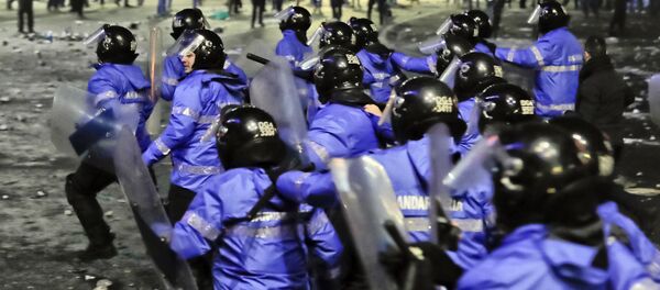 Jandarmeri în timpul protestelor la București. Arhivă - Sputnik Moldova