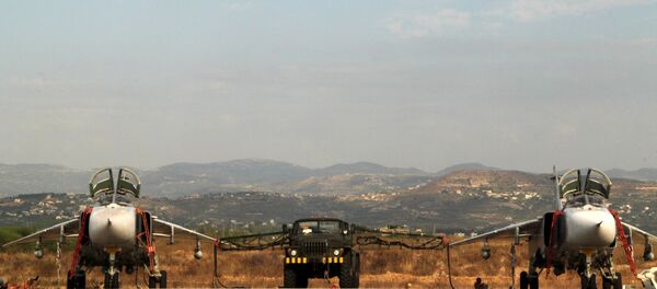 Российские самолеты СУ на аэродроме около Латакии Российские самолеты СУ на аэродроме около Латакии - Sputnik Молдова