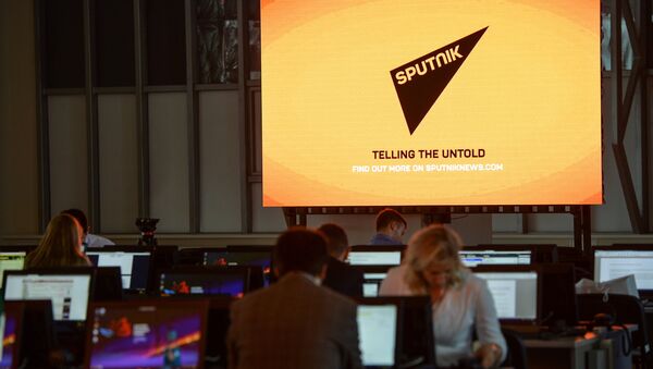 A screen featuring the logo of the Sputnik International News Agency and Radio seen at the media center of the Eastern Economic Forum, Vladivostok - Sputnik Молдова