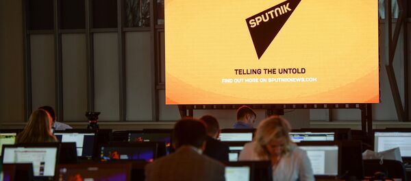 A screen featuring the logo of the Sputnik International News Agency and Radio seen at the media center of the Eastern Economic Forum, Vladivostok - Sputnik Молдова