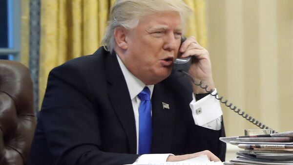 US President Donald Trump speaks on the phone - Sputnik Moldova-România