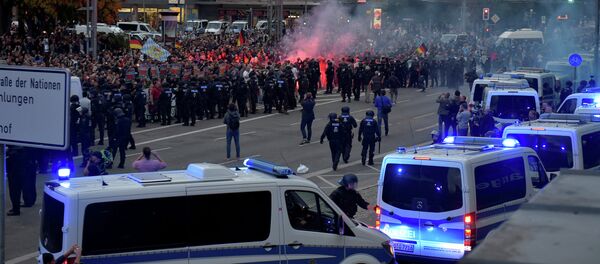 Полиция во время акции протеста в Хемнице, Германия. 27 августа 2018 Полиция во время акции протеста в Хемнице, Германия. 27 августа 2018 - Sputnik Moldova-România