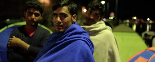 Беженцы. Архивное фото Беженцы. Архивное фото - Sputnik Молдова