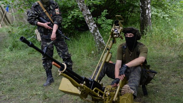 Боец народного ополчения на востоке Украины - Sputnik Молдова